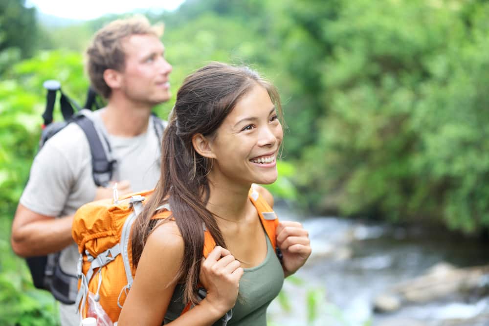 Young diverse couple enjoying hiking and exploring at the Adirondack Adventure Center