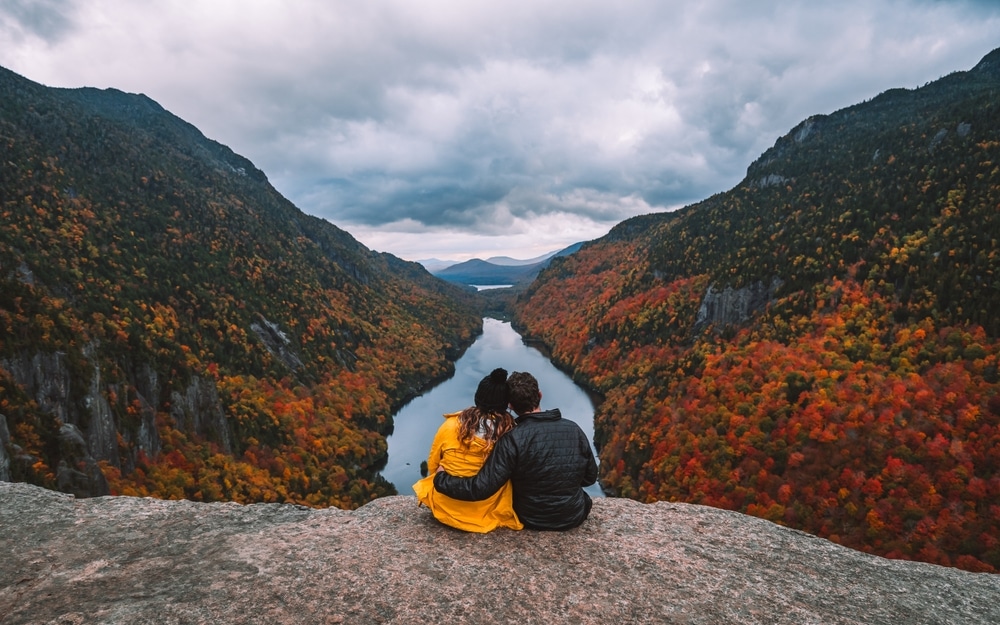The Ultimate List of Things to Do in Upstate NY This Fall | Adirondack Hotel Hiking through the fall foliage in the Adirondacks is one of the best things to do in Upstate NY.